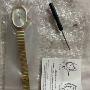 Gold Akribos Watch with Oval Face